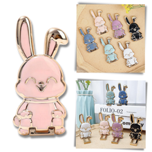 Carica l'immagine nel visualizzatore di Gallery, Supporto per telefono a forma di coniglietto - Ozerty